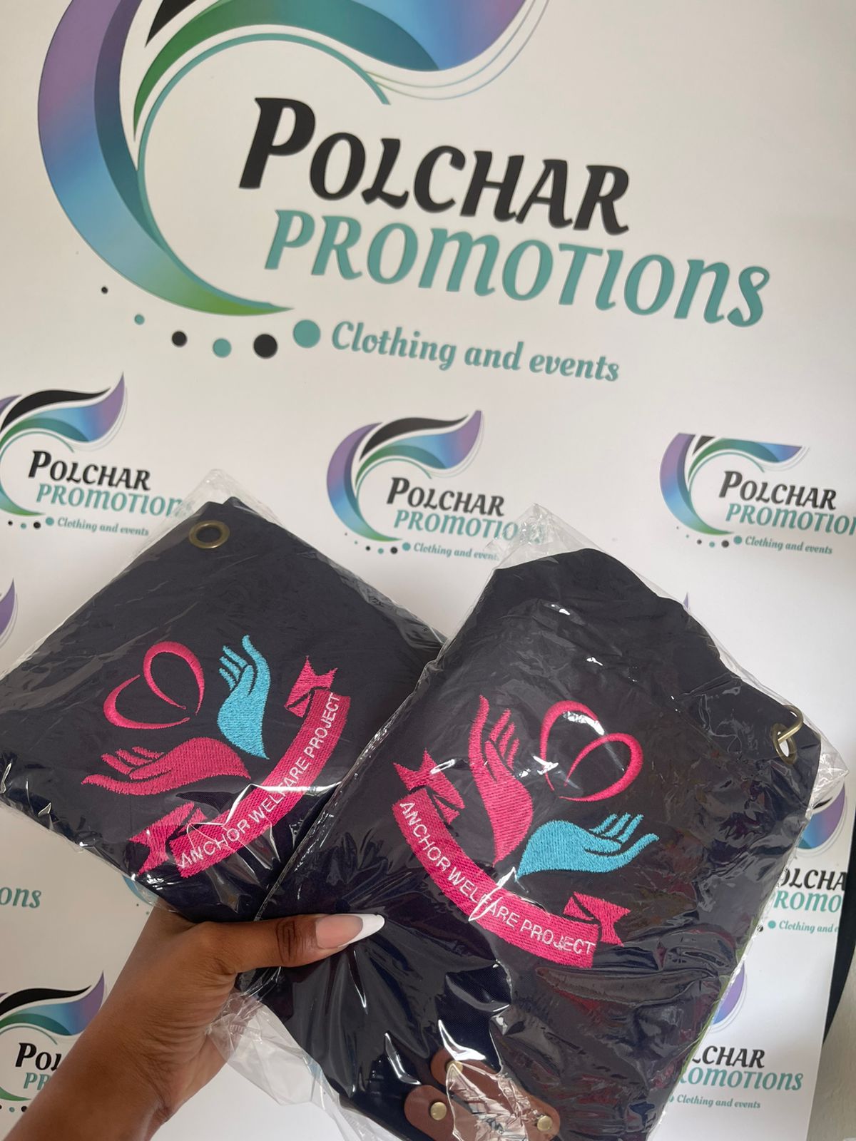 Bulk branded shirts packaged for school