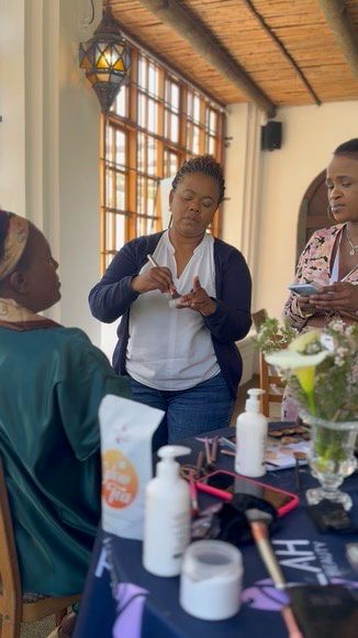 Women entrepreneurs at a Basadi skills workshop station